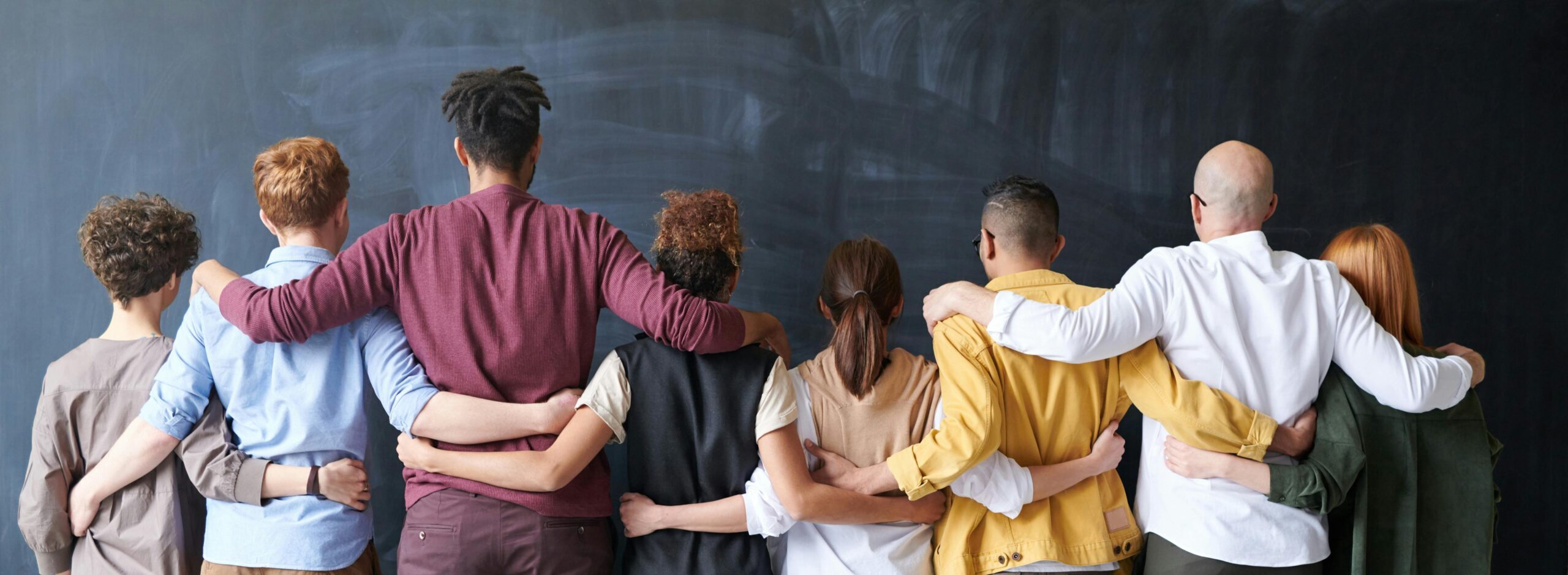 Group of people standing indoors